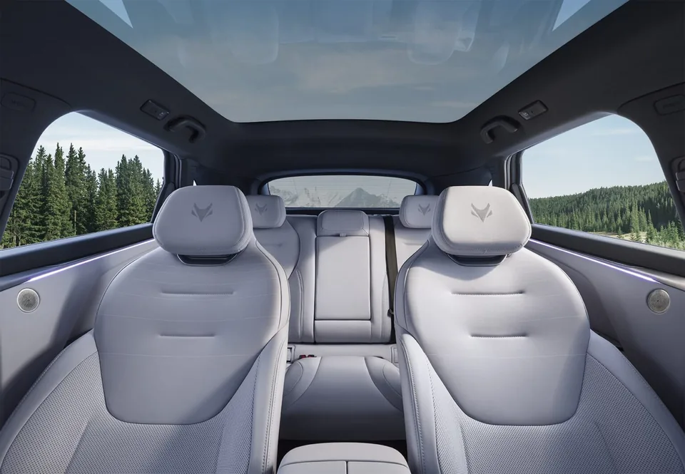 ARCFOX T5 front seats with embossed headrests, seen from behind under the glass roof